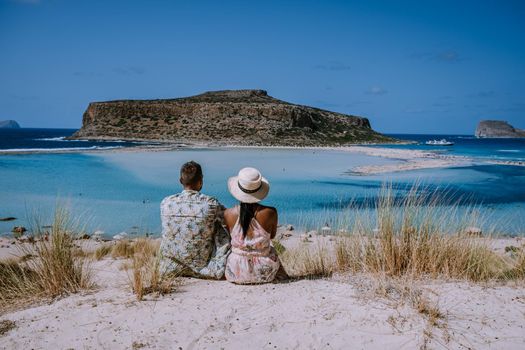 Balos Beach Cret Greece, Balos beach is on of the most beautiful beaches in Greece at the Greek Island couple visit the beach during vacation holiday in Greece