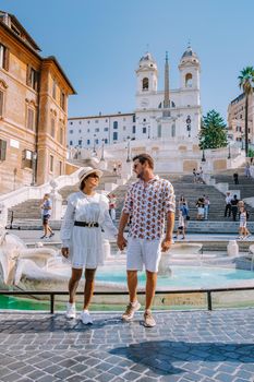 The Spanish Steps in Rome, Italy. The famous place is a great example of Roman Baroque Style. Italy couple on city trip in Rome