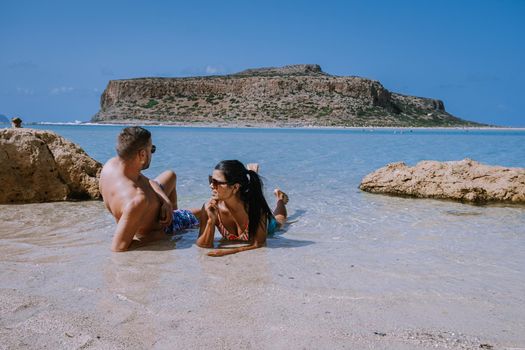 Balos Beach Cret Greece, Balos beach is on of the most beautiful beaches in Greece at the Greek Island couple visit the beach during vacation holiday in Greece