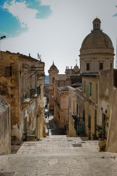 Sicily Italy, view of Noto old town and Noto Cathedral, Sicily, Italy. beautiful and typical streets and stairs in the baroque town of Noto in the province of Syracuse in Sicily