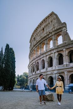 View of Colosseum in Rome and morning sun, Italy, Europe. 