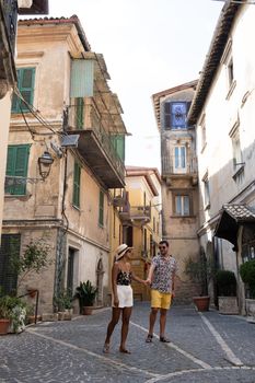 Overview of Fiuggi in Italy, Scenic sight in Fiuggi, province of Frosinone, Lazio, central Italy. Europe, couple walking on the colorful streets of Fiuggi