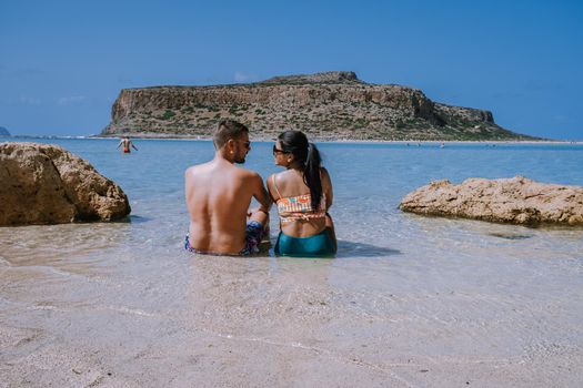 Balos Beach Cret Greece, Balos beach is on of the most beautiful beaches in Greece at the Greek Island couple visit the beach during vacation holiday in Greece