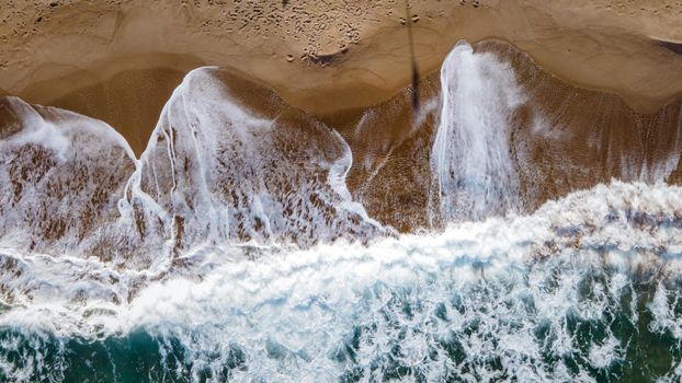 huge big waves from above at the Island of Sicily, drone view at beach and huge waves Sicilia