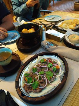 Lunch at a cafe. View of the table with food and drink. Uzbek cuisine.