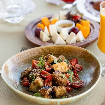 Eggplant salad with cheese on the table