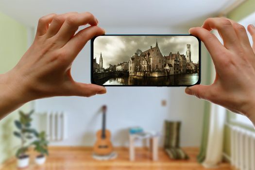 Online trip to European old town Brugge in Belgium using a smartphone at home