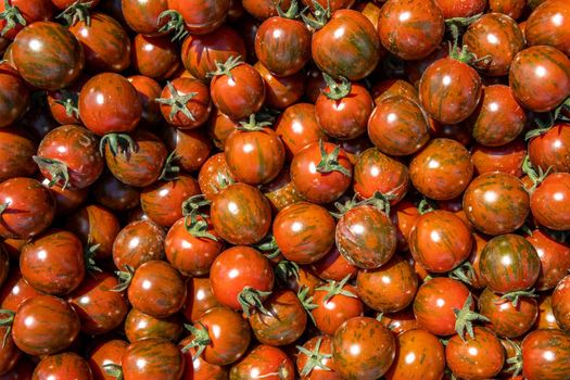 background from red ripe tomatoes grown without chemistry.
