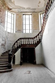 A carved wooden staircase in ancient palace