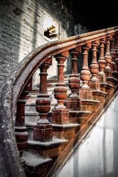 Old wooden railing of a vintage staircase