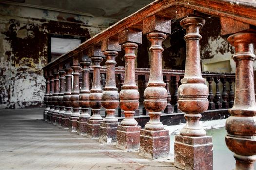 Old wooden railing of a vintage staircase