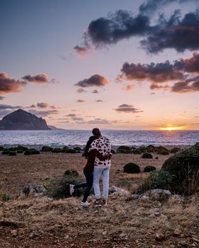 San Vito Lo Capo Sicily, San Vito lo Capo beach and Monte Monaco in background, north-western Sicily. cliffs and rocky coastline in Sicily