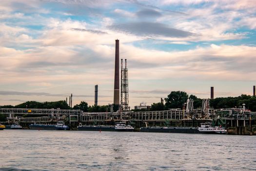 Cologne Germany August 2020, Inland shipping transport on the rhine river with containers, Large container and oiltanker vessel on the river rhein in Germany Europe