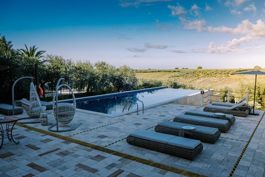 Luxury resort with a view over the wine field in Selinunte Sicily Italy. infinity pool with a view over wine fields in Sicilia
