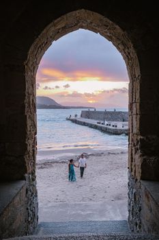 Cefalu, the medieval village of Sicily island, Province of Palermo, Italy. Europe, a couple on vacation at the Italian Island Sicilia