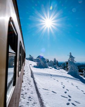 Harz national park Germany, Steam train on the way to Brocken through the winter landscape, Famous steam train through the winter mountain. Brocken, Harz National Park Mountains in Germany Europe