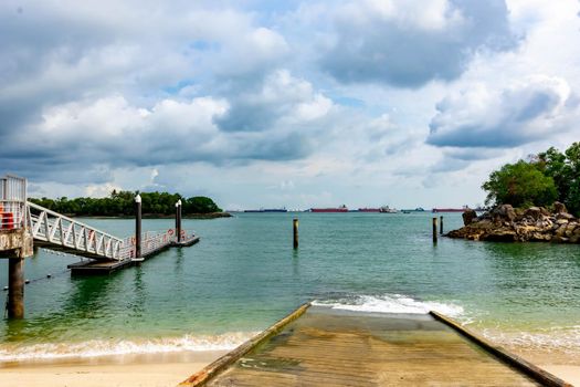 Siloso Sentosa Beach with White sand and tourists, Singapore, March 30, 2020