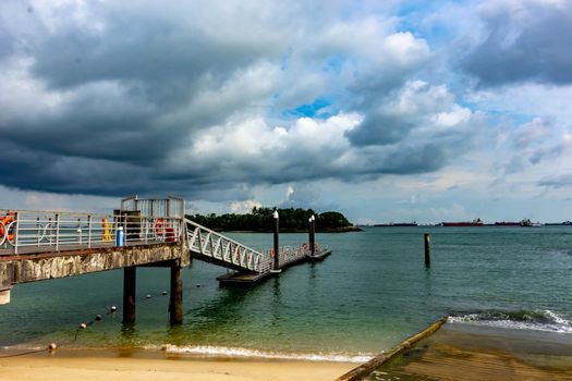 Siloso Sentosa Beach with White sand and tourists, Singapore, March 30, 2020