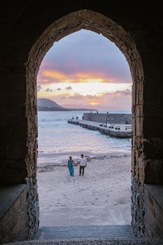 Cefalu, the medieval village of Sicily island, Province of Palermo, Italy. Europe, a couple on vacation at the Italian Island Sicilia