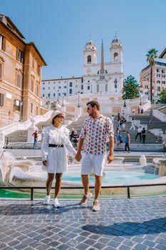The Spanish Steps in Rome, Italy. The famous place is a great example of Roman Baroque Style. Italy couple on city trip in Rome
