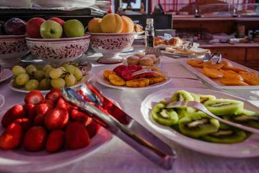 Taormina Sicily Italy breakfast table with a rooftop view over Taormina breakfast with coffee bread and fruit