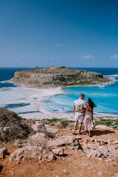 Balos Beach Cret Greece, Balos beach is on of the most beautiful beaches in Greece at the Greek Island couple visit the beach during vacation holiday in Greece