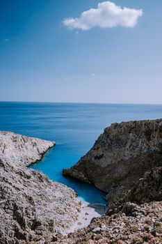 Crete Greece Seitan Limania beach with huge cliff by the blue ocean of the Island of Crete in Greece, Seitan limania beach on Crete, Greece. Europe