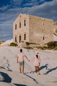 Punta Bianca, Agrigento in Sicily Italy White beach with old ruins of an abandoned stone house on white cliffs. Sicilia Italy, couple on vacation in Italy