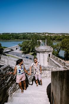 couple city trip Avignon Southern France, Ancient Popes Palace, Saint-Benezet, Avignon, Provence, France Europe