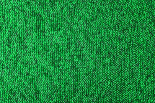 mixed green and black knitted texture and flat background