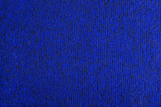 mixed blue and black knitted texture and flat background