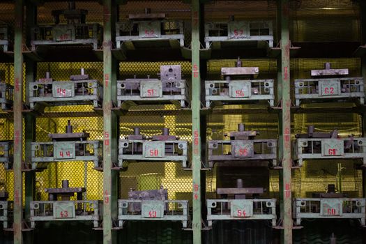 small stamps storage rack inside of old factory