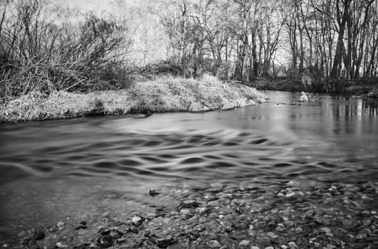 Frosty river with sunrise cold day