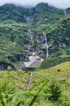 mountain landscape with small waterfall