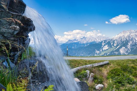 Mountain landscape in Summer with waterfall