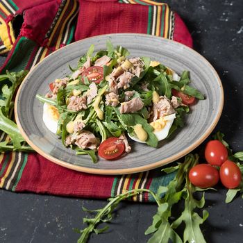 Chicken meat with herbs tomato salad