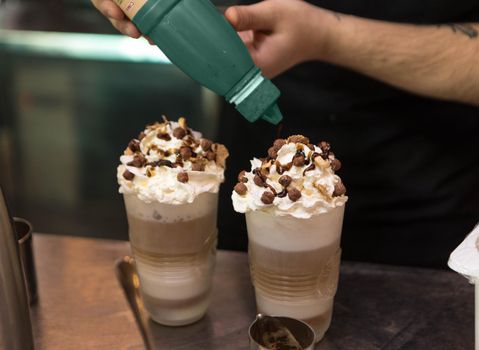 Barista making beautiful coffee ice cream