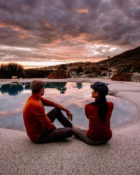 Agriturismo bed and breakfast at Sicily Italy, beautiful historical old farm renovated as BB Sicilia, a couple on vacation at Sicilian luxury agriturismo