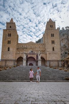 Cefalu, the medieval village of Sicily island, Province of Palermo, Italy. Europe, a couple on vacation at the Italian Island Sicilia