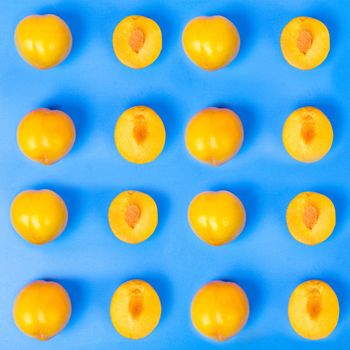 Yellow plum fruit on the white background isolated