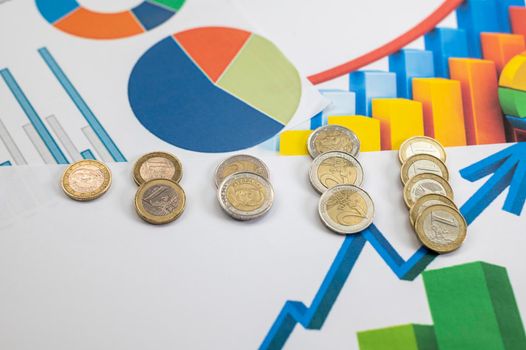 euro coins different denominations with statistics as colorful background