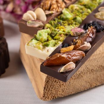 Beautiful chocolates with nuts close up