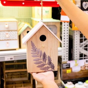 Wooden birdhouse at the store