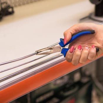 Holding metal with needle-nose pliers