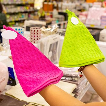 Purple and green baby hat at the store