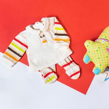 Baby girl clothes and toy stuff, baby fashion concept