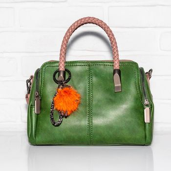 Green female bag on a white background isolated