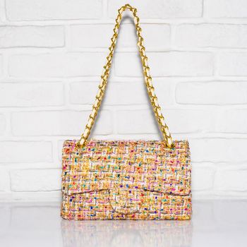 Patterned female bag on a white background isolated