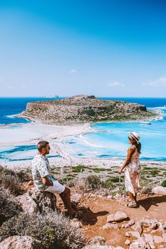 couple men and woman mid age on vacation at the Greek Island Crete. Europe