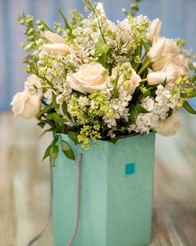 Beautiful white flower bouquet in the box close up